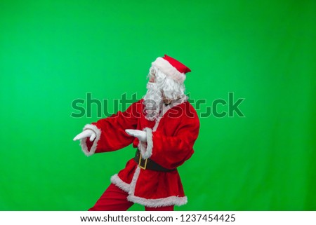 Santa Claus dancing chroma key (green screen). Santa funny dancing isolated on green