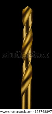 Closeup Isolated photo of gold drill bit on black background