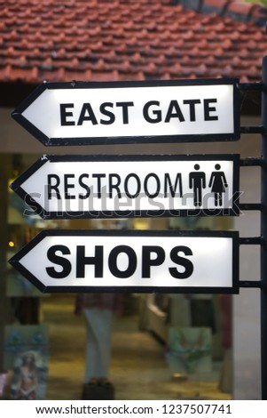 
Lighting shop and restroom direction signs in the mall