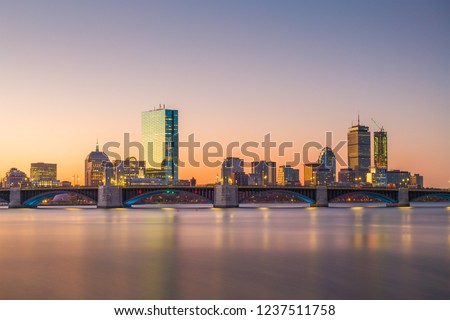 Boston, Massachusetts, USA skyline on the Charles River at dawn.