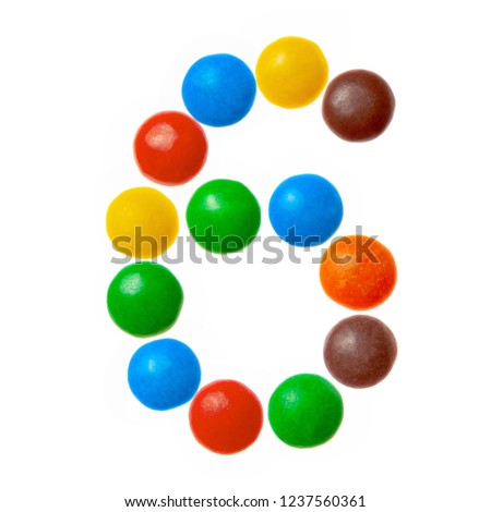 Number 6 six of sweet colored candies, alphabet isolated on white background