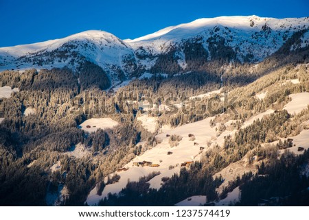Alpine village in the mountain hills 