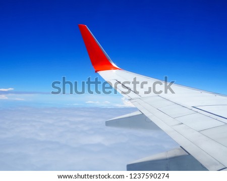 Morning sunrise with Wing of an airplane. Photo applied to tourism operators. picture for add text message or frame website.