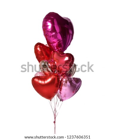 Bunch of metallic red pink heart balloons composition objects for birthday or valentines party isolated on a white background