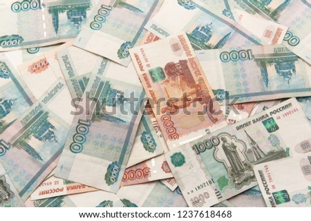 lot thousandths rouble banknotes money is on the background
