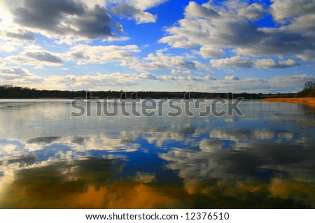 Lake, Poland - blue sky over water
