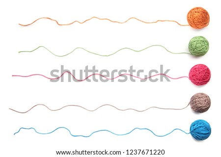 Colorful cotton thread balls isolated on white background. Set of five color (orange, pink, grey, green, blue) thread balls.
 Royalty-Free Stock Photo #1237671220