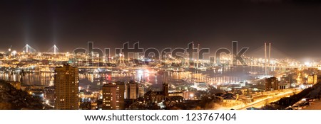 Vladivostok cityscape night view from east to west, panorama.