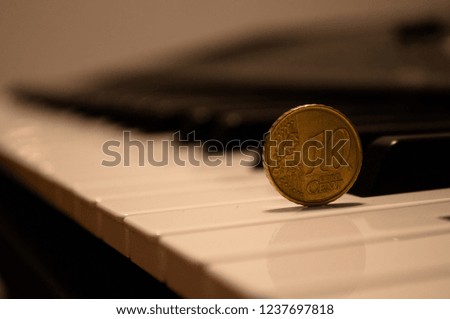 Coins on the piano
