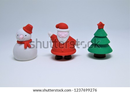 Merry Christmas and Happy New Year Santa Claus Snowman and Christmas tree isolated