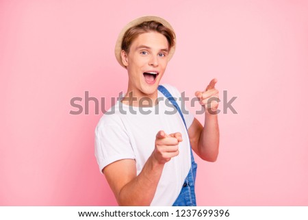 Close up studio photo portrait of handsome glad cool in good mood delightful cute dreamy with open mouth boy pointing at you isolated pastel background