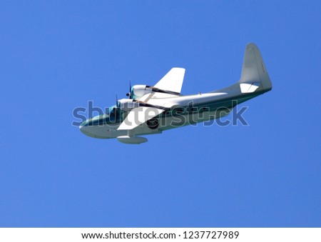 amphibious airplane searching above the sea