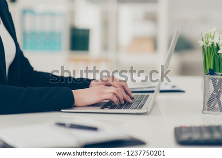 Profile side view cropped classy chic elegant lady hands attorney lawyer manager typing notepad laptop at light white modern workplace workstation desktop table Royalty-Free Stock Photo #1237750201