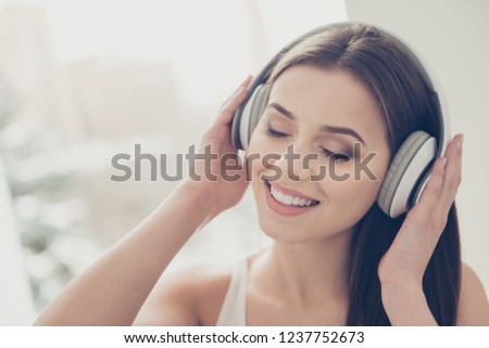 Close up photo portrait of beautiful attractive pretty dreamy charming lovely cute sweet gorgeous nice adorable lady with her closed eyes she listen music in comfort modern light house