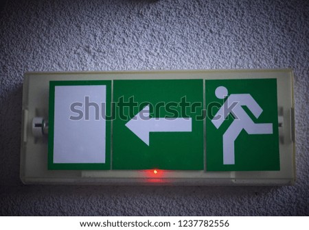 Exit sign on the wall