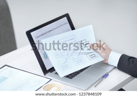 businessman examining financial document.photo with copy space