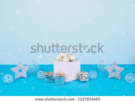 Christmas tree balls on a blue background with a place for your text.
