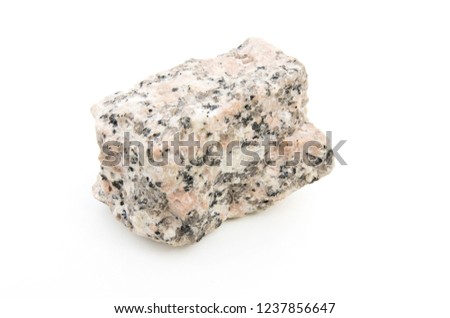 close up of granite rock isolated over white background Royalty-Free Stock Photo #1237856647