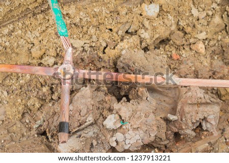 Welding copper ground wire on ground rod.Welding copper ground wire.Connect copper grounding lightning protection system. With the melting