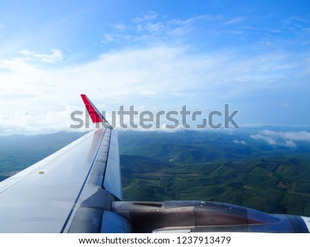 Morning sunrise with Wing of an airplane. Photo applied to tourism operators. picture for add text message or frame website.