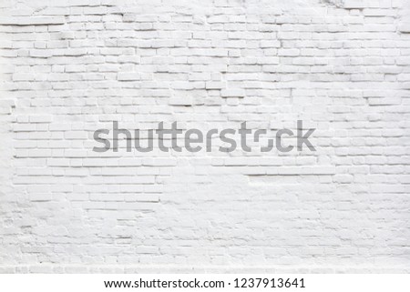 White Rustic Texture. Retro Whitewashed Old Brick Wall Surface. Vintage Structure. Grungy Shabby Uneven Painted Plaster. Whiten Facade Background. Design Element. Abstract Light White Web Banner.