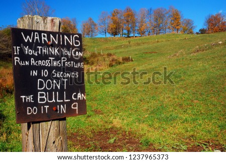 A humorous sign warns potential tresspassrs to stay off the property