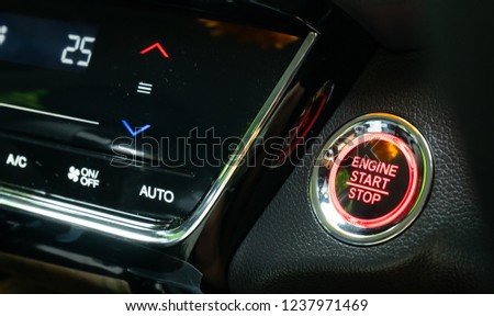Engine start button with air control panal on Luxury caris a new technology used instead of starting the engine with keys in Transportation and safety concept