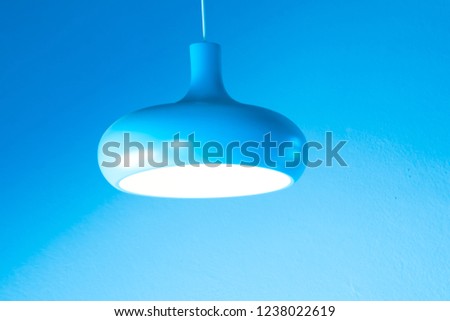 Blue hanging lamp isolated on background