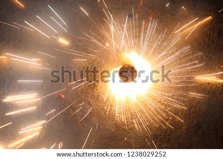 lights and sparks. Abstract black background. Bright flashes and glares. Bright rays of light. Glowing lines. colourful smokes