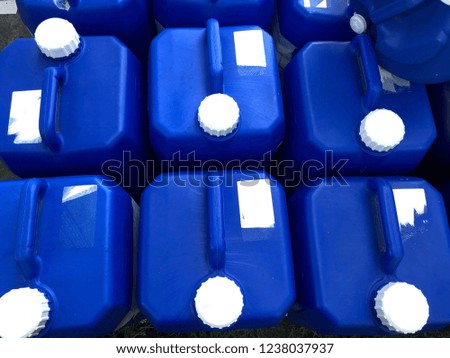 Storage with plastics gallons, container with liquid chemistry, for used in industry. Top view.