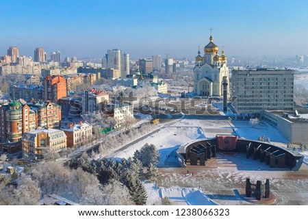 Winter day in Khabarovsk. Glory square.
Transfiguration Cathedral. Far East, Russia. Royalty-Free Stock Photo #1238066323