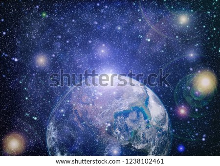 Earth, sun and galaxy. Elements of this image furnished by NASA