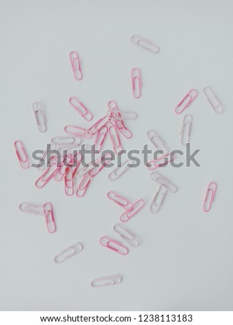 pink paper clips background