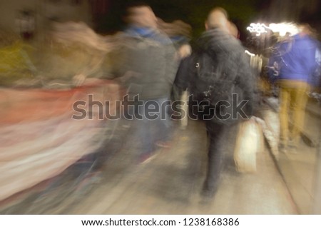 tourists, ghostly human figures in the Albaicín, Granada, Artistic night photographic sweep, sensation of movement, blurred people, impressionist photography, abstract, nightlife, atmosphere, holidays
