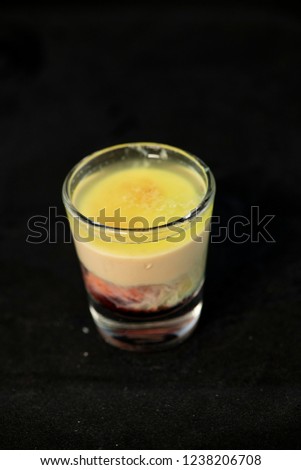 Alien Brain Hemorrhage shot cocktail with schnapps, blue curacao, baileys irish cream and grenadine
