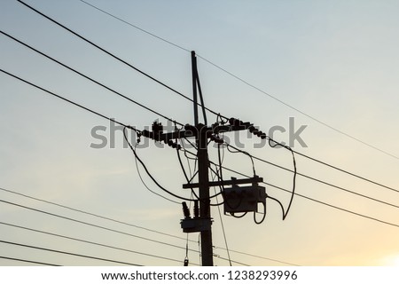 
consumer medium-voltage power pole is the people to use energy and small industry in the warm and romantic evening sky atmosphere.