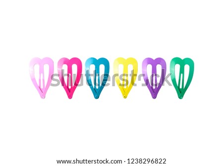 Colored hair clips isolated on white background