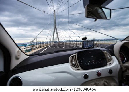 view of The Normandy Bridge in France across the river Seine from the car window. Pont de Normandie. Autotrip
 Royalty-Free Stock Photo #1238340466
