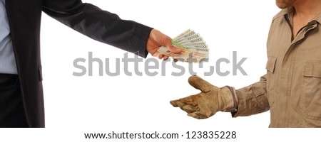 Business man gives money to a worker in gloves Royalty-Free Stock Photo #123835228