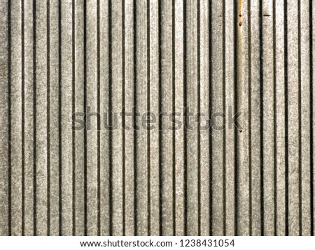 

Embossed corrugated metal surface of camouflage coloring.	Background.						