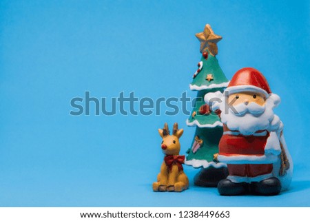 Santa Claus and deer with blue background , Happy holiday Christmas theme