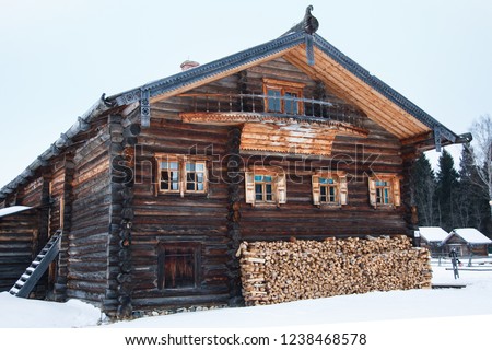 Wooden house. Winter. Cabin. Log hut. Russia