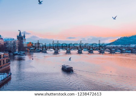 
Bridge in Praha. Sunset over the river Vlatva. Czech Republic.