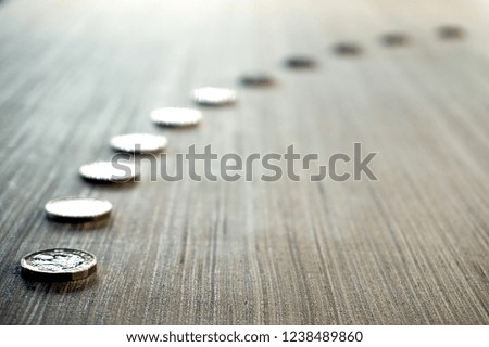 Coins Heading Towards Right Background