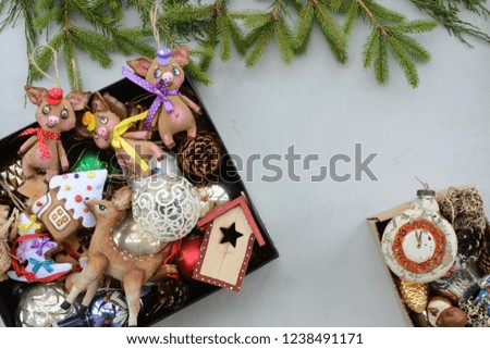 Christmas and New Year toys on a gray concrete background