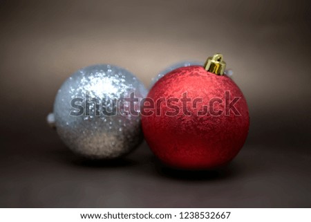 Variety of three Christmas tree decoration balls isolated on a dark background