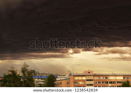 Thunderstorm looming over the city. Picture of approaching storm
