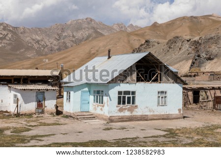Residential hous of border town Sary-Tash in Kyrgyzstan to neighboring Tajikistan on the Pamir Highway in Central Asia