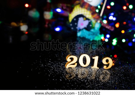 2019 happy new year wood number Christmas decoration and snow with bright background and copy space
