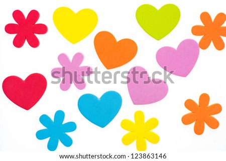 multi colored hearts on white background.